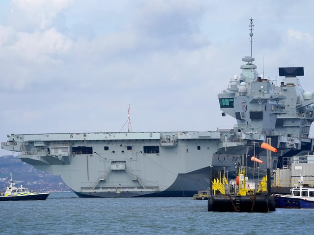 HMS Prince of Wales moored in Portsmouth Harbour.