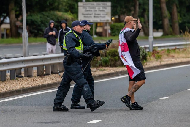 The M275 is brought to a standstill by Anti-immigration protesters. Picture: Mike Cooter (070824)