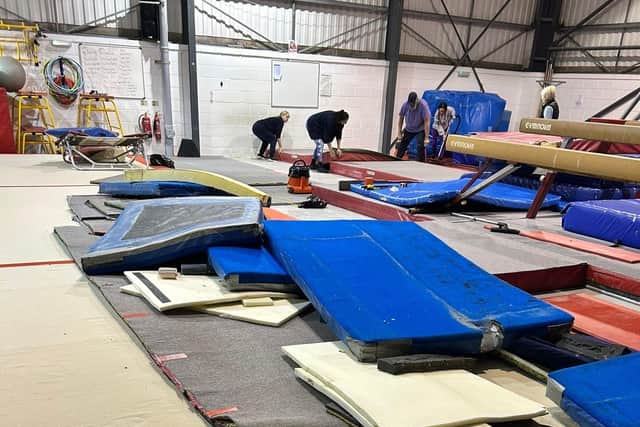 Volunteers trying to salvage the flooring