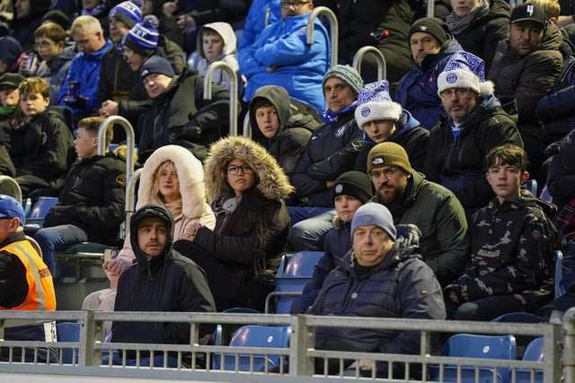 The 20,415 fans packed into Fratton Park had to wrap up warm for the game.
