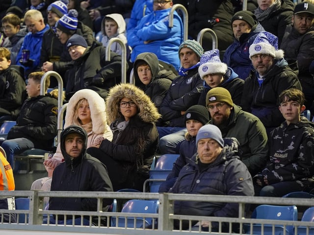 The 20,415 fans packed into Fratton Park had to wrap up warm for the game.
