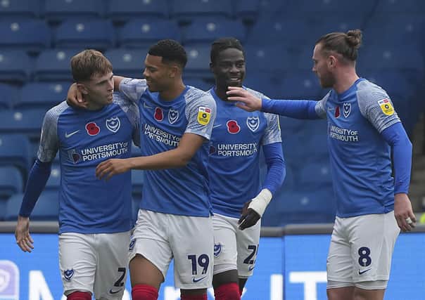 Zak Swanson is congratulated after his maiden Pompey goal. He was also Gaffer for a Day Ashley Arnell's choice as man of the match. Picture: Barry Zee