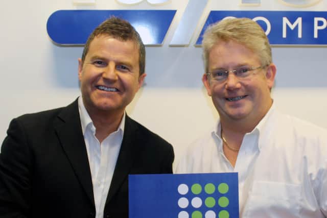 Express FM station manager Miles Henson (left) insists the football club have no editorial control over their Pompey Live coverage. Picture: Emma Downing