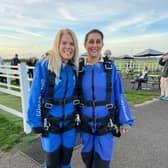 Solent NHS Trust's chief of staff, Rachel Cheal, and former chief people office, Jas Sohal, have raised £1,800 with their skydive for Solent NHS Charity.
