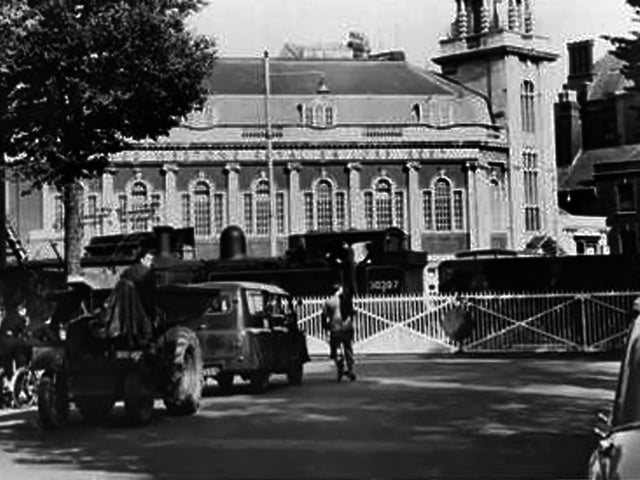 A steam train crosses the junction of Unicorn Road and what was Edinburgh Road in 1953