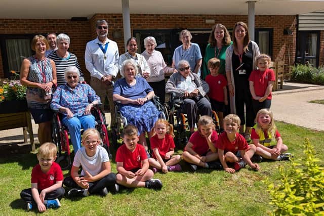 The Mayor of Fareham with residents, team members and children at Ancasta Grove.