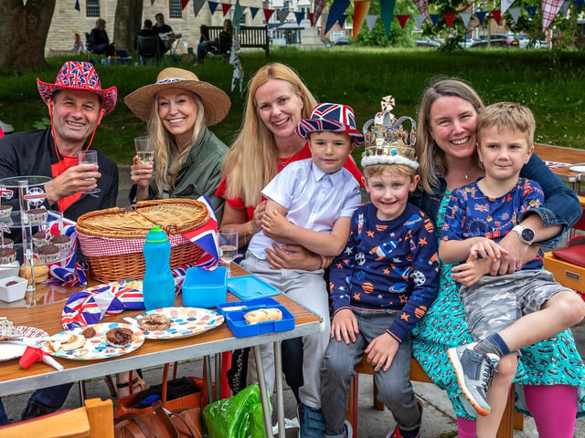 Outdoor fun at the Portsmouth Cathedral jubilee street party. Pictured: Adam Knight (48), Lisa Houghton (46), Kathy Knight (47), Harvey Knight (6), Louis Houghton-Taylor (wearing a crown to selebrate his sixth birthday), Yvonne Wiggins (45) and Benedict Williams (6). Picture: Mike Cooter (050622)