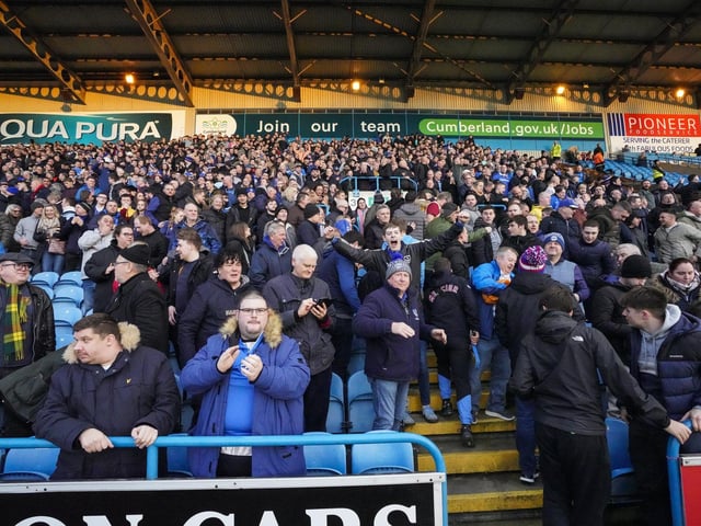 It's a 14-hour round trip between Portsmouth and Carlisle - but these fans don't care!