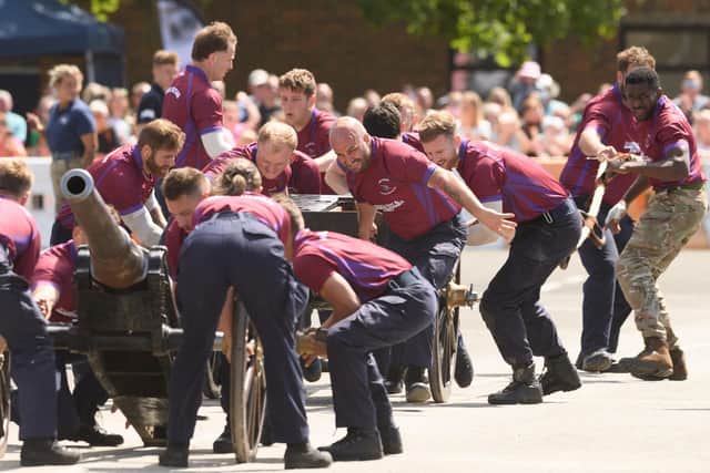 The teams battled it out as they attempted to dismantle, reassemble and fire the gun in the shortest possible time.