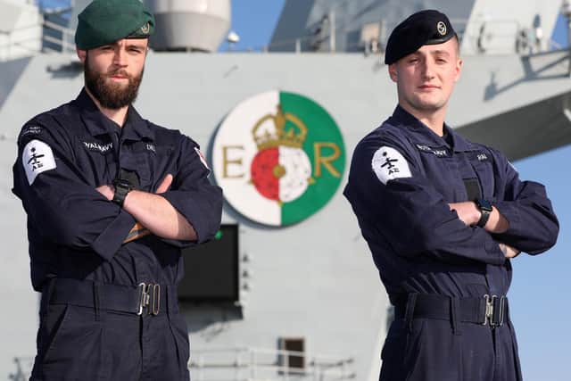 Pictured here are LAE Dee and AE Azsairi who ran a marathon on the flight deck of HMS Queen Elizabeth.  Photo: LPhot Luke