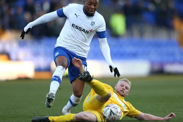 New Moneyfields signing Corey Heath challenges Tranmere's Morgan Ferrier at Prenton Park in December 2019. Photo by Lewis Storey/Getty Images.