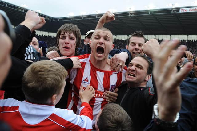 Stoke's Carl Dickinson celebrates with the fans winning promotion to the Premier League following a goalless draw against Leicester City in May 2008. Picture: Dave Thompson/PA Wire