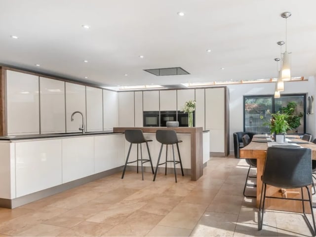 This property comes with six bedrooms, five bathrooms and five reception rooms as well as a swimming pool and a gym.