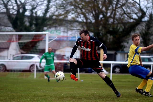 Bryn Mckie on the ball for Fleetlands against Locks. Picture: Tom Phillips.