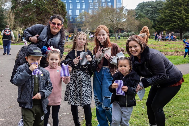 Mums Chantelle Law, 33, and Ri Wilkin, 32, with their families receiving their prizes at end of the Easter trail