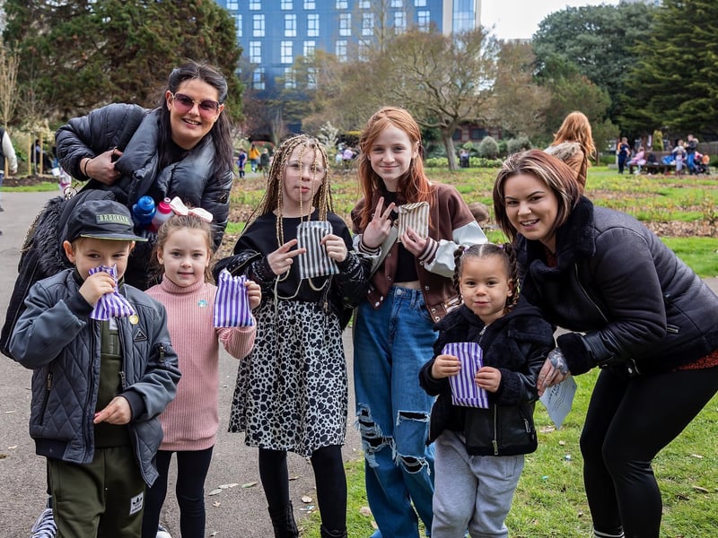 Mums Chantelle Law, 33, and Ri Wilkin, 32, with their families receiving their prizes at end of the Easter trail