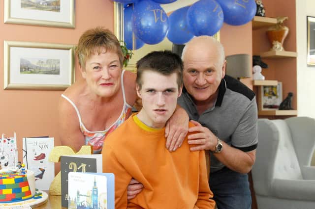 Liam Derbyshire from Alverstoke, turned 21 on Monday, August 3. Pictured is: Liam Derbyshire (21) with his mum and dad Kim (60) and Peter (63). Picture: Sarah Standing (030820-1899)