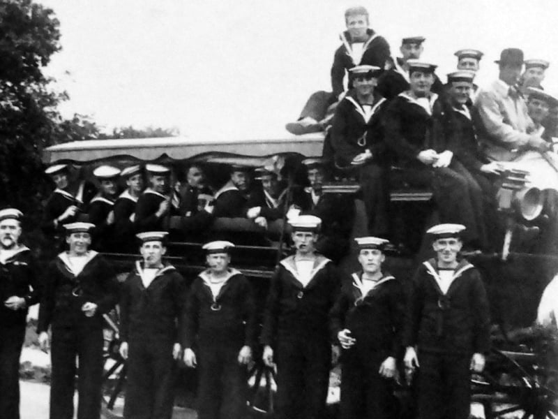 A day out in a horse drawn charabanc was well received by sailors from HMS Excellent. Picture: Robert James postcard collection.