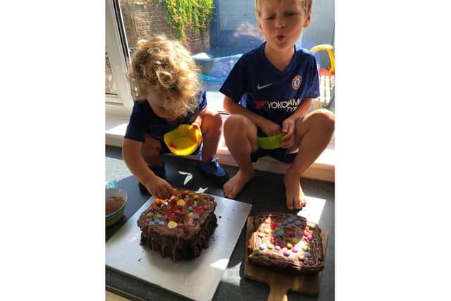 Seth Thompson from Baffins, five, asked his mum if she could bake an extra birthday cake so they could give it to a family on the next street. Pictured: Seth, right, with his brother Caleb