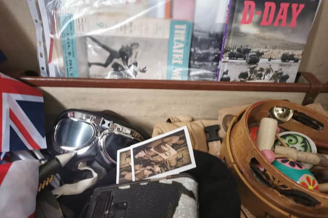 Rachel Goodall, from Milton, aims to bring some fun back into care homes with her boxes full of activities. Pictured: Props and items from one of the historical boxes
