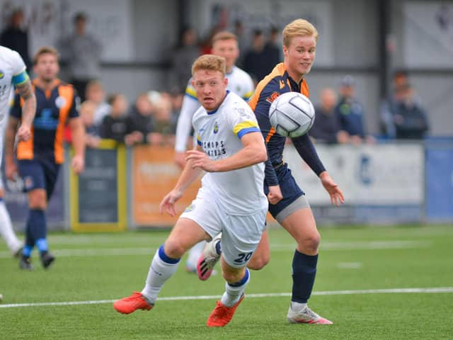 Tommy Wright in action against Slough last weekend - his red card will now rule him out of league games at Chelmsford and Tonbridge and the FA Cup first round trip to Charlton Athletic. Picture: Martyn White