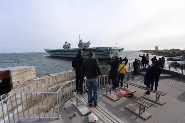 Crowds gather at The Round Tower to watch HMS Queen Elizabeth depart from Portsmouth on April 29. Photo: Habibur Rahman