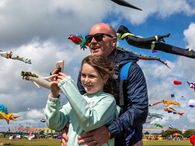 Frankie Glackin (9) chooses an epic backdrop for a selfie with her dad Marcel Glackin (44). Picture: Mike Cooter (070821)