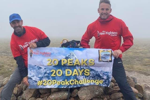 Firefighter Sean Ratcliffe (left), 52, of Gosport Fire Station, with Jason Haste, 40, of Havant Fire Station during their '20 peaks in 20 days' challenge for the Fire Fighters Charity.