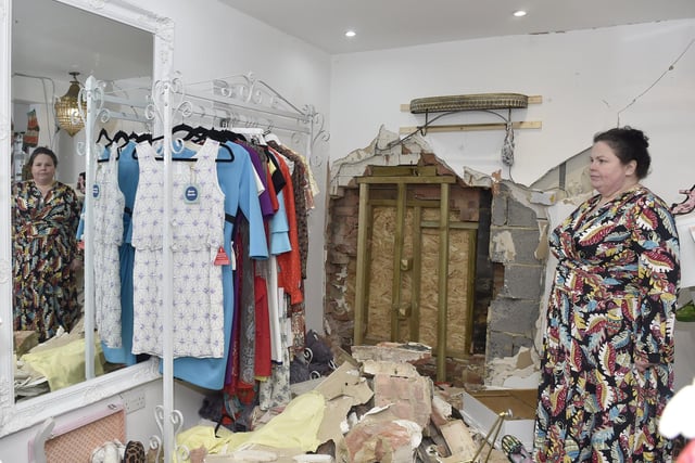 Voluptuous Vintage owner Jennifer Darling surveys the damage to her shop. Picture: Sarah Standing