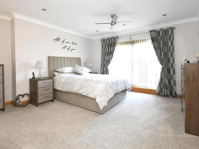 Moving upstairs now to the first floor, and a look at the master bedroom. Part of an extension to the original building, it has a Juliet balcony overlooking the back garden, not to mention its own en suite and dressing room.