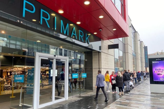 Keen shoppers wait their turn for Primark.