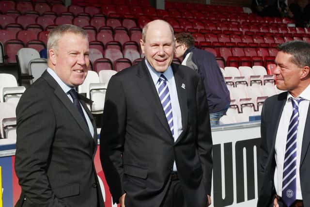 Pompey manager Kenny Jackett, left, with club chairman Michael Eisner, centre, and CEO Mark Catlin