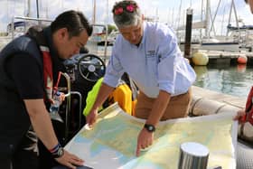 Alan discusses coastal issues on Hayling Island with Chichester Harbour Master Richard Craven (picture from before Covid).