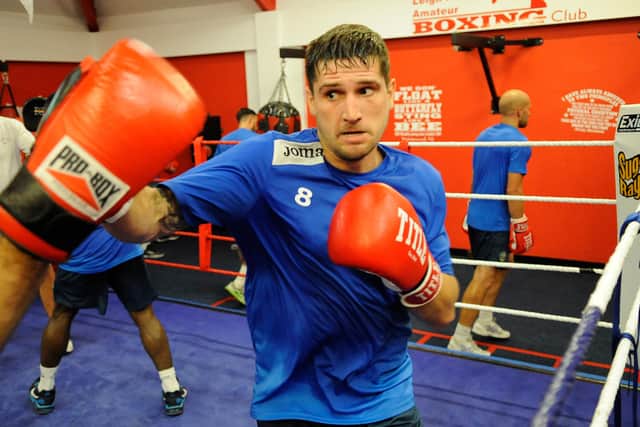 Steve Ramsey packs a punch during a Hawks training session at Leigh Park Boxing Club in September 2013. Picture: Malcolm Wells.
