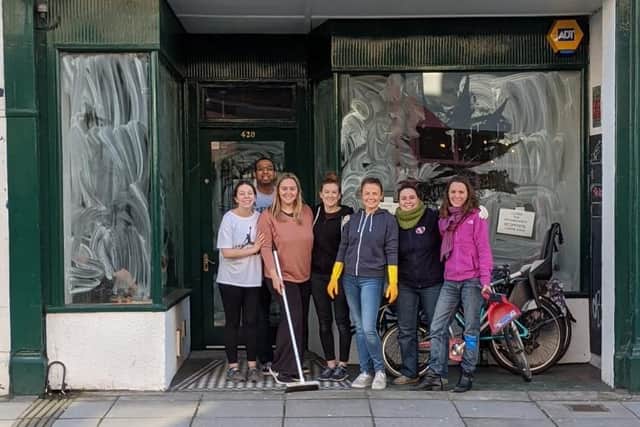 Volunteers Connie Fenner, Agnivesh Sathasivam, Ashleigh Edwards, Sammy Higgs, Ella Lawson, Esther Rodriguez Perez and Delphine Laveyne outside their new unit for the Package Free Larder in Elm Grove, Southsea. 