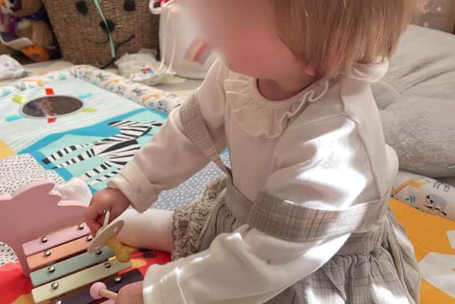 Now Ava is sitting up, she loves to play with her toys