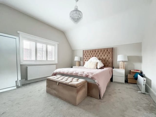 This property comes with three bedrooms, one bathroom and two reception rooms as well as parking and a garden.