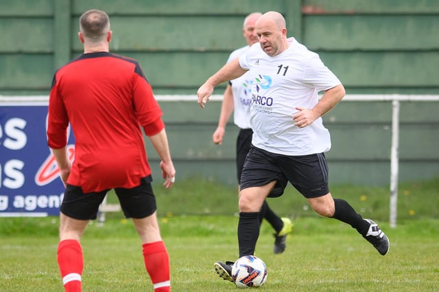 Action from the Jon Gittens memorial charity match between a team of former Fareham Town players and a side of ex-Pompey and Southampton professionals. Picture: Keith Woodland (160421-176)