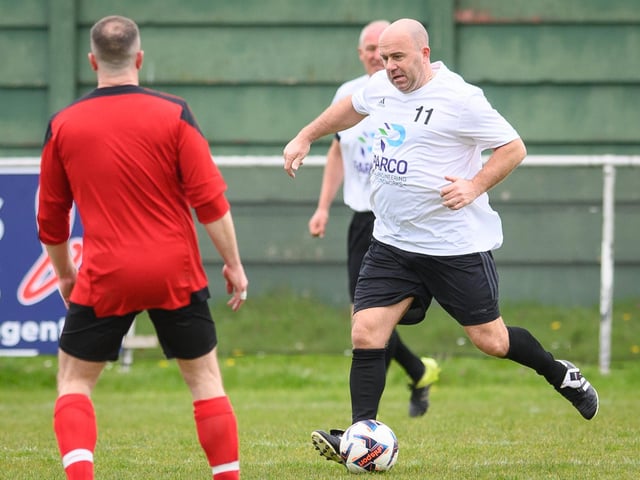 Action from the Jon Gittens memorial charity match between a team of former Fareham Town players and a side of ex-Pompey and Southampton professionals. Picture: Keith Woodland (160421-176)