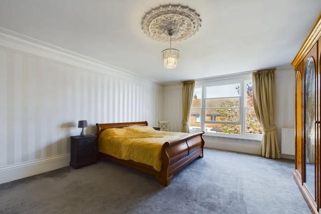 This property comes with six bedrooms, three bathrooms and five reception rooms as well as parking and a back garden.