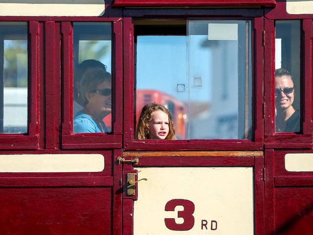 Passengers enjoying the festivities on the Hayling Island railway.