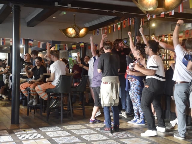 England fans at O'Neils in Albert Road, Southsea, watching the England v Denmark match in the Euro's.Picture: Sarah Standing (200624-4669)