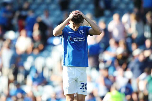 Pompey's players were met with a chorus of boos following the defeat to Cambridge United Photograph:PinPep Media / Joe Pepler