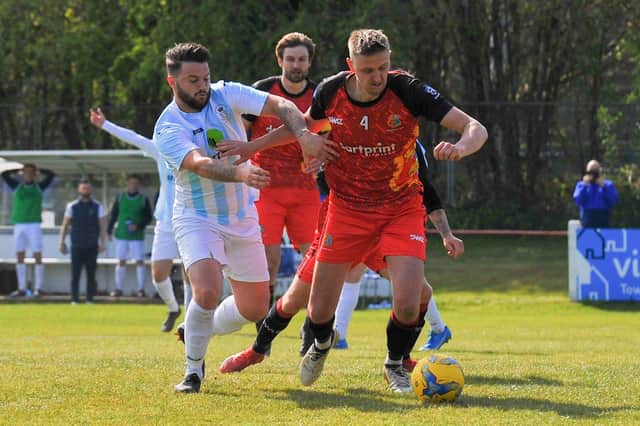 Jack Chandler, left, in action for US Portsmouth during last week's FA Vase fifth round win at Tavistock. Picture: Martyn White.