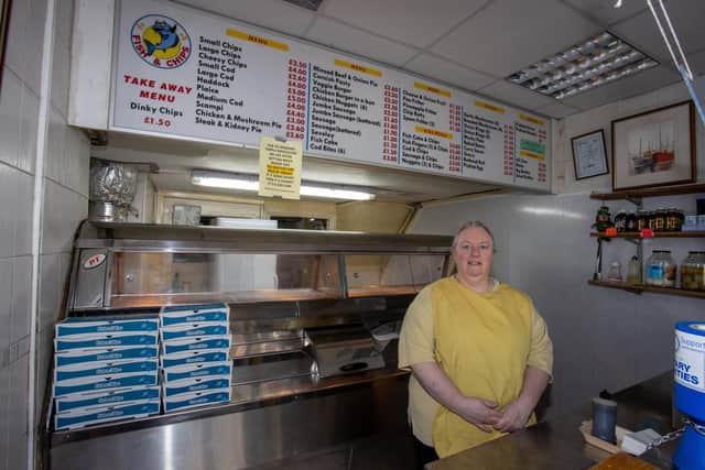 Rebecca Traynor behind the counter the Traditional Fish and Chip in West Street, Fareham. Photos by Alex Shute
