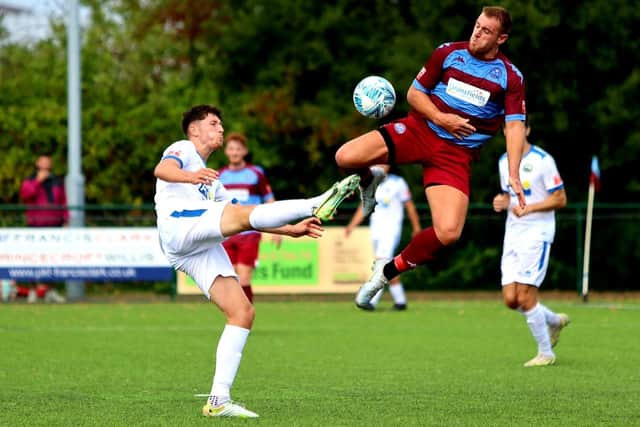 Brendan Willson, left, in action for Gosport during the 0-0 FA Cup stalemate at Hamworthy. Picture by Tom Phillips