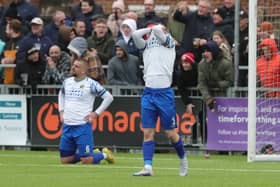 Joe Newton (right) reacts after Sam Magri (on knees) had been adjudged to have given away a penalty. Picture by Dave Haines