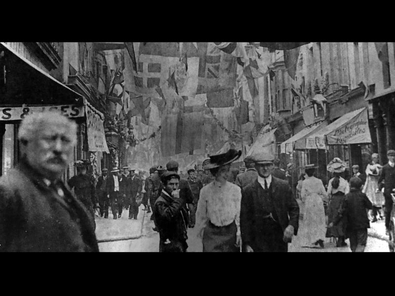 The scene of Queen Street, Portsea, in 1905 - a wonderfully revealing picture of life in the Edwardian era. Picture: The Royal Portsmouth Dockyard Historical Society.