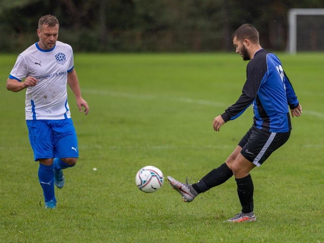 Padnell (blue) v AC Copnor Reserves. Picture by Mike Cooter