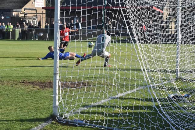 Casey Bartlett-Scott scores for Fareham against Brockenhurst in the Wessex League Premier Division this season. Pic: Paul Proctor.
